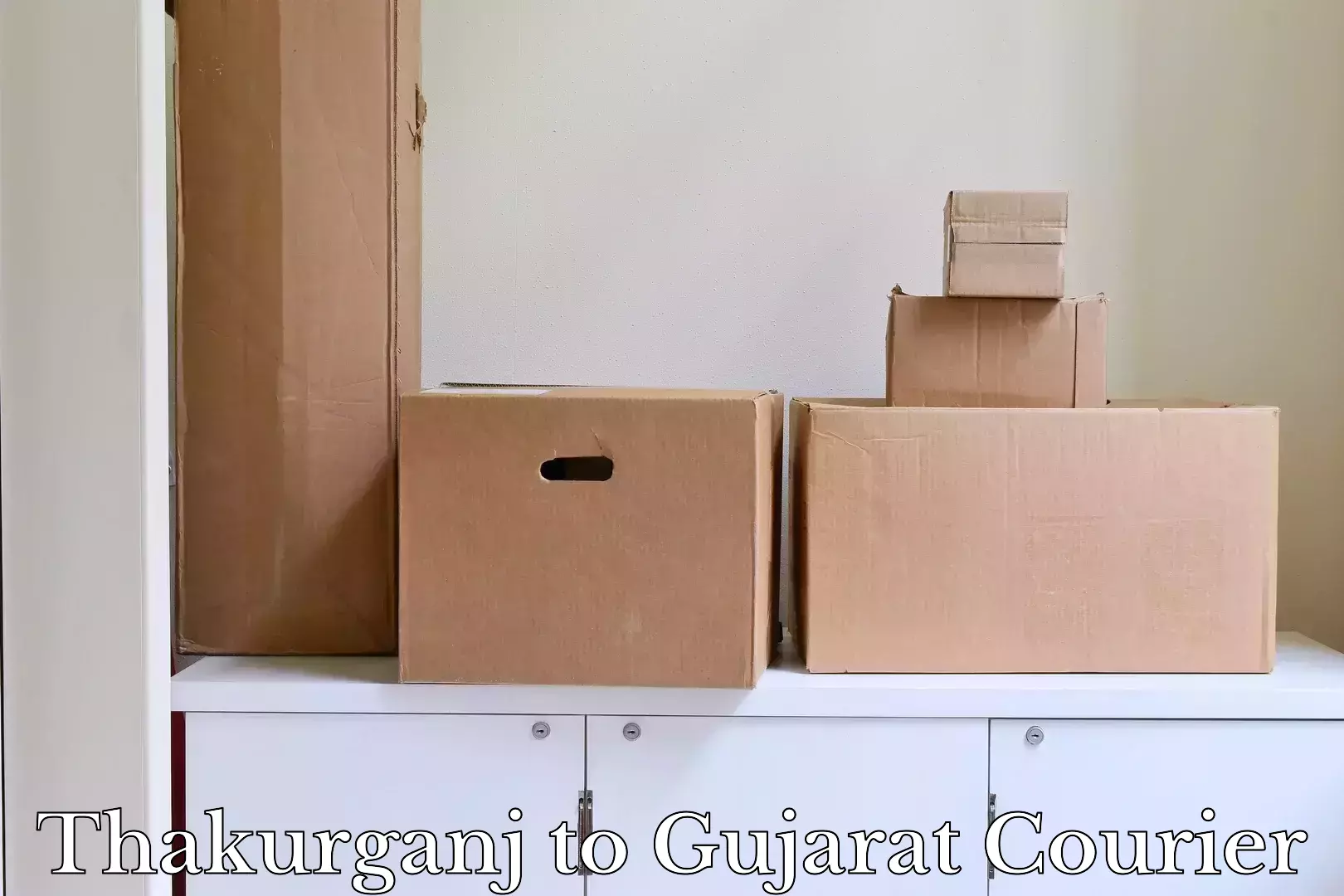 Baggage shipping logistics Thakurganj to Gujarat
